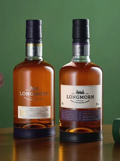 For this Longmorn whisky shot, we created a study-like setting with a leather chair and a green book. The scene tells a story of quiet contemplation and refined taste, perfectly matching the character of a single malt.