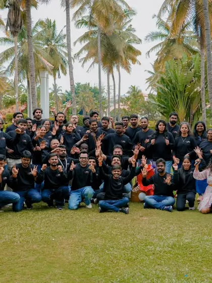 It's not just about weddings. I also capture the energy of corporate events, like this fun team outing in Bangalore. Getting a great group shot with everyone celebrating is always a highlight.