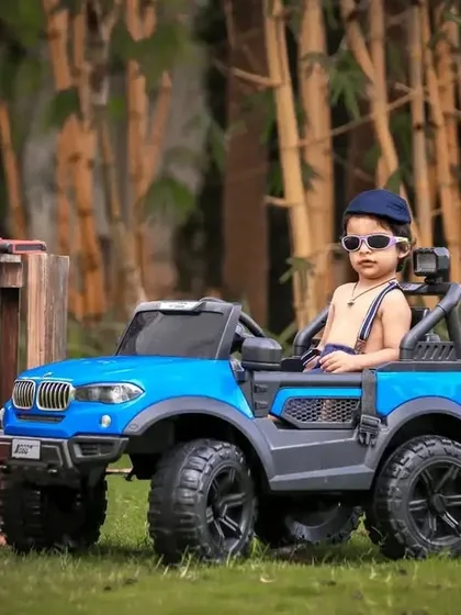 For the cool toddler in your life, we offer fun outdoor themes like this "Little Garage" setup. Complete with a toy car and props, it's a great way to capture their playful personality.
