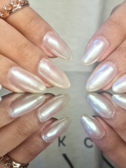 A detailed close-up of the pearlescent white finish, highlighting its beautiful, subtle shine.