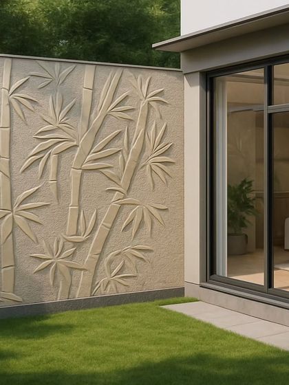 A serene bamboo-themed stone mural adds a natural and calming element to this garden wall, perfectly complementing the surrounding greenery.
