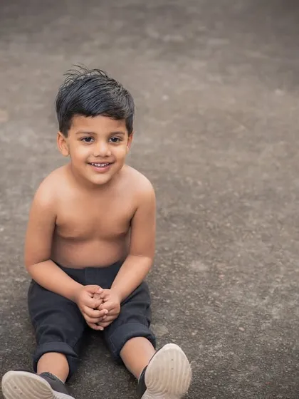 A simple, candid outdoor portrait of a young boy. Sometimes the most natural, unposed moments are the most precious.