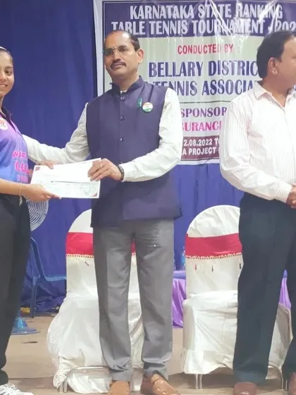Sahana H Murthy being awarded for her performance as the Women's runner-up at the Bellary State Ranking Tournament.