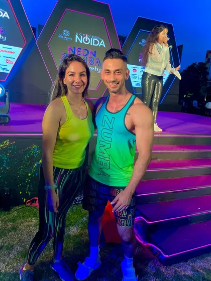 With my mentor at a Zumba event. I am always learning and growing as an instructor to bring the best to my classes.