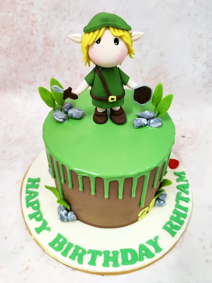 A wider view of our Link Zelda Cake, showing the full design with the "Happy Birthday" message and earthy details.