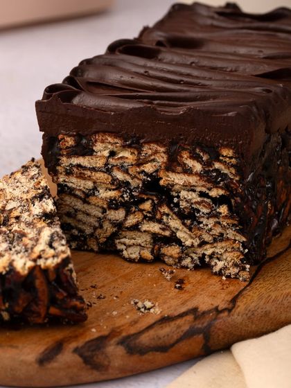 A close-up of my chocolate biscuit cake, revealing the wonderful texture of crushed biscuits bound together with rich, dark chocolate. A nostalgic treat with a gourmet twist.