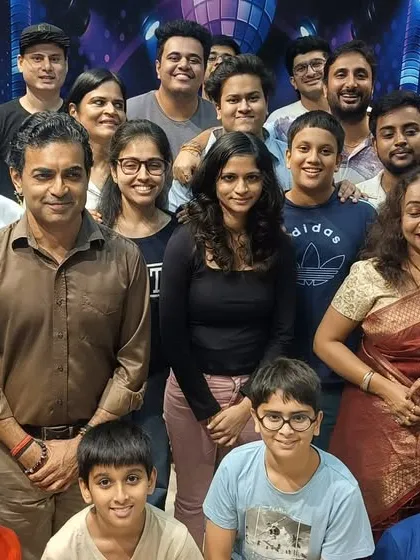 This is our Spectrum World family. This group photo captures the wonderful mix of students, parents, and teachers who come together to learn, create, and celebrate at our academy events.