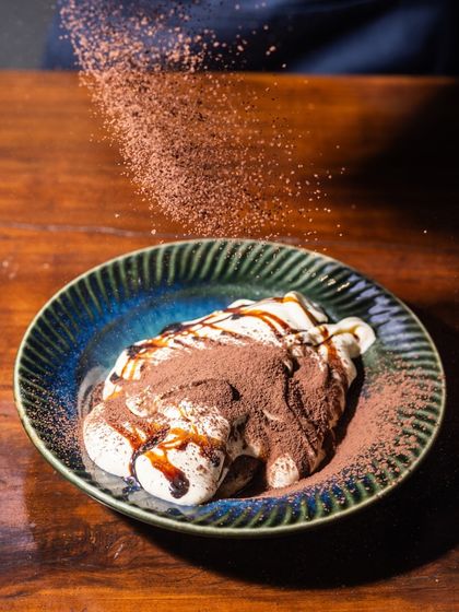 Heaven in every bite. My crowd-favourite tableside Tiramisu is always the right choice, finished with a generous dusting of cocoa powder.