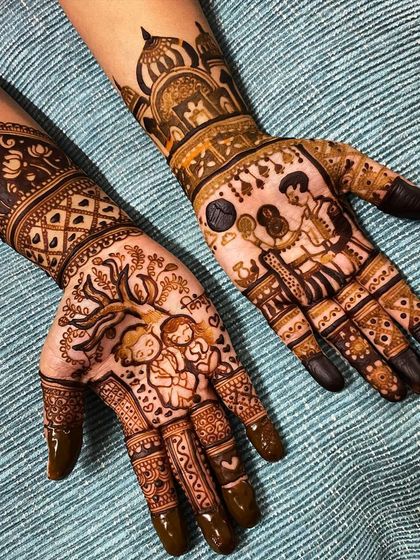 A beautiful example of storytelling mehndi. One hand shows a couple under a tree, representing their journey, while the other features a detailed palace design, fit for a royal celebration.