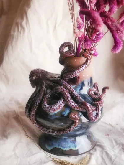 I get very attached to some pieces, and this octopus vase is one of them. I love the challenge of sculpting something so detailed and full of life onto a wheel-thrown form.
