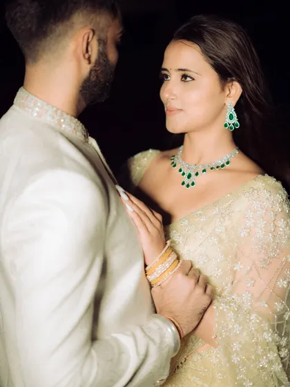 The magic is in the details: the quiet glance, the elegant jewelry, the soft lighting. This cinematic close-up from an engagement shoot in Mumbai captures the intimacy and romance of the moment. I focus on these subtle details to tell a deeper, more personal story of your connection.