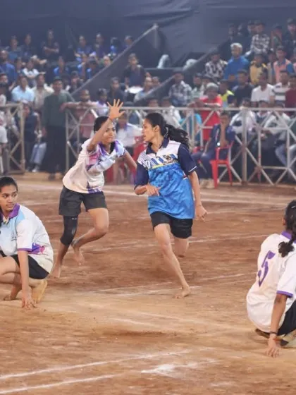 Our women players demonstrating excellent teamwork and communication during a match.