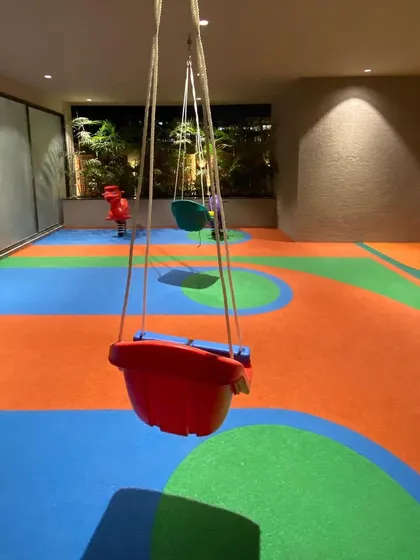 Bucket swings and other age-appropriate equipment are carefully selected for our toddler zones to ensure safety and developmental fun.