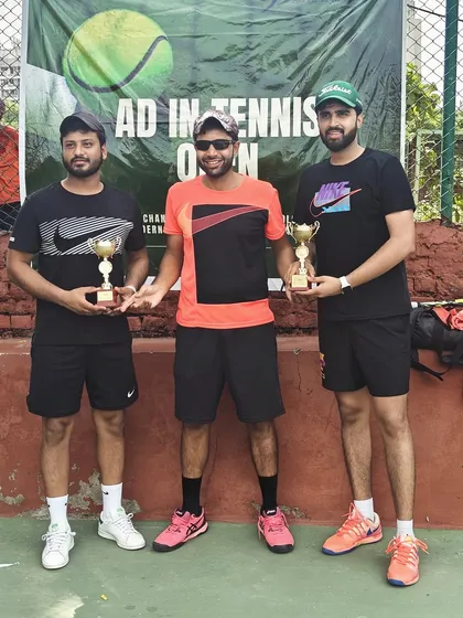The winners of the Men's Doubles category at the Ad In Tennis Open. This event attracts talented adult players from across the city.