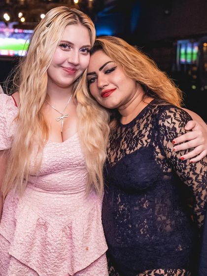 Two friends enjoying the night at Gawky Goose.