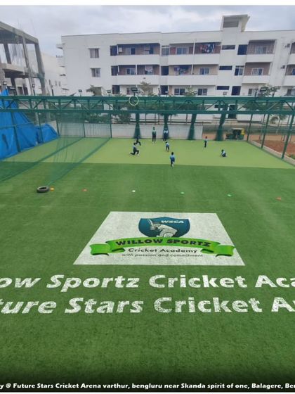 A wide shot of our facility at Future Stars Cricket Arena, with our logo proudly displayed on the pitch.