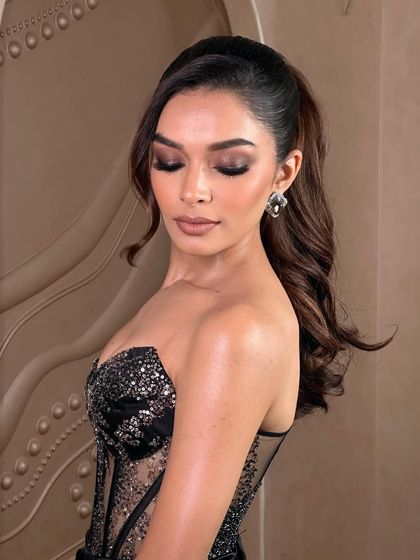 A close-up of the "shutdown" glam. The eyes are the focus, with a deep, smokey look, while the skin is sculpted and glowing, creating a look of pure drama.