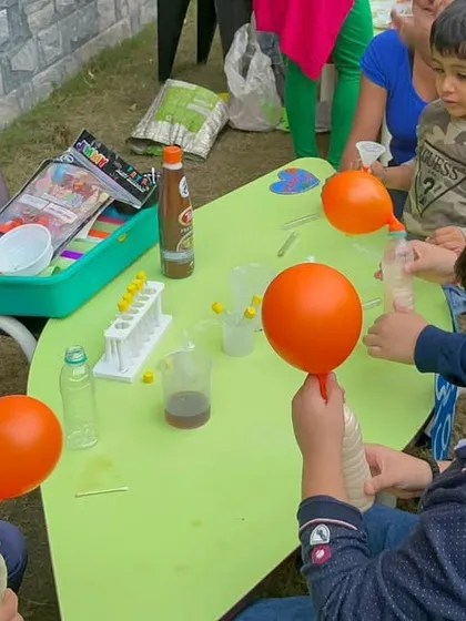 Science is magical when you can see it in action. Children at our launch event were captivated by this simple but amazing experiment that uses a chemical reaction to inflate a balloon.
