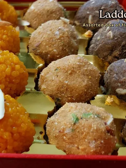 Our assorted laddoo box is a true crowd-pleaser. This box features a variety of our best laddoos, including classic motichoor, rich besan, and nutty dry fruit options, all made with traditional recipes.