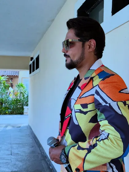 My look for a pool party. A colorful blazer and sunglasses set the perfect tone for a fun, sun-soaked event.