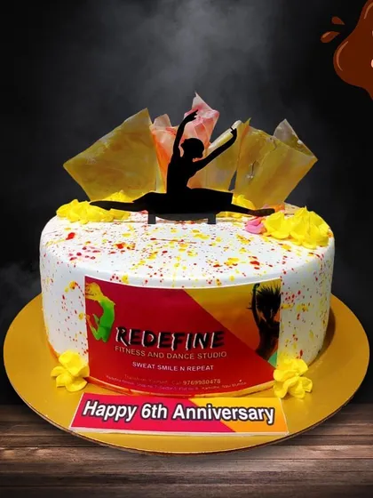 I created this custom cake to celebrate the 6th anniversary of a local fitness and dance studio. The design features a silhouette of a dancer against a vibrant, artistic background.