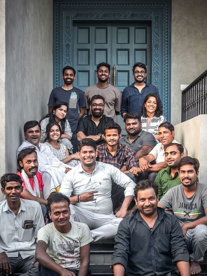 A project is never the work of just two people. This is our incredible team of designers, site supervisors, and craftsmen who helped bring the 'Prangan' project to life. Their dedication and skill are the backbone of everything we do.