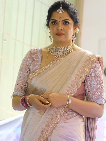 Photos from my housewarming, wearing a saree and blouse I designed myself. I took a plain tissue saree and completely transformed it with a hand-worked scalloped border and a custom-stitched velvet blouse. It’s a look that’s very close to my heart.