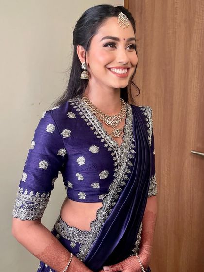 A smile that lights up the room. This reception look is all about celebrating happiness, with makeup that is radiant and joyful.