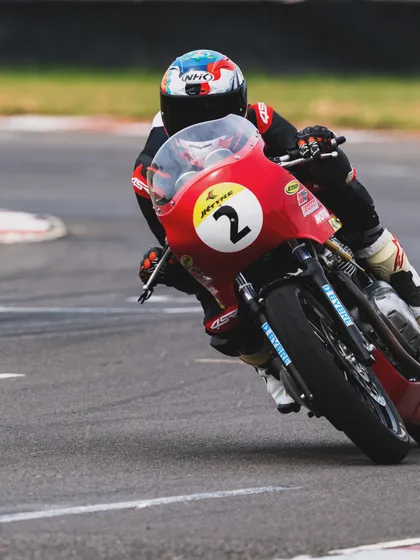 An action shot of Anish Shetty, number 2, navigating a corner during the GT Cup race.
