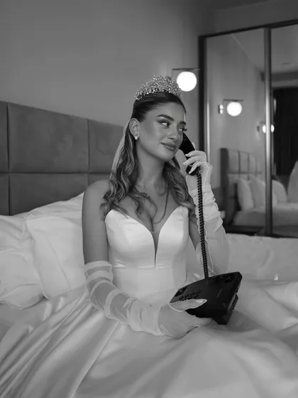"Calling you one last time as your girlfriend." A playful and nostalgic black and white shot of the bride on a vintage phone before her wedding.