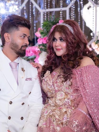 Sharing a look with my husband amidst the beautiful floral decor. These are the moments I will cherish forever.