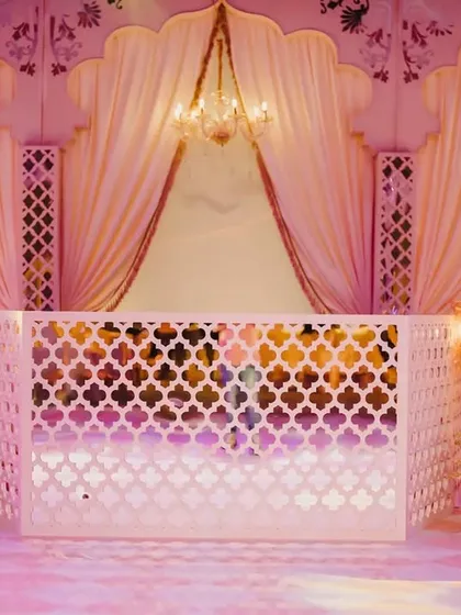 The details make the design. We created this DJ booth to resemble a 'Jharokha' window, embedding it into the stage backdrop so every element felt cohesive and grand.