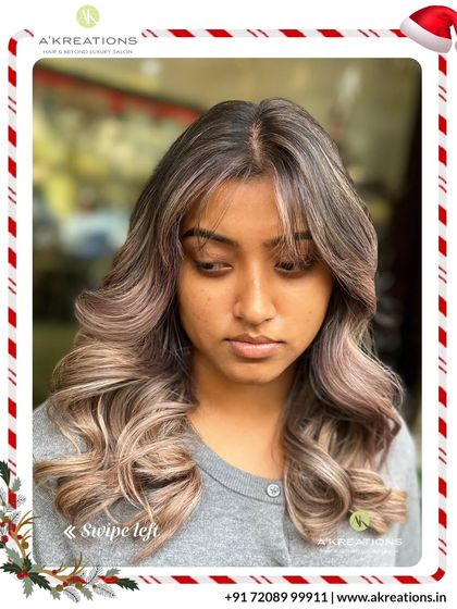 This stunning ash-blonde balayage creates a beautiful gradient effect. The soft curls at the end add volume and showcase the seamless color transition.