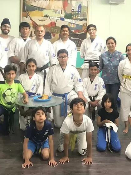 A moment of togetherness and celebration at the dojo. We are more than a class; we are a family that supports each other in and out of training.