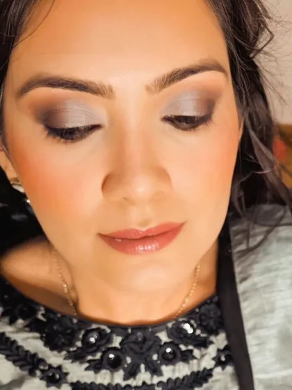 This subtle glam look is all about effortless beauty. The makeup is polished and refined, perfect for a client who wants to look her best with confidence.
