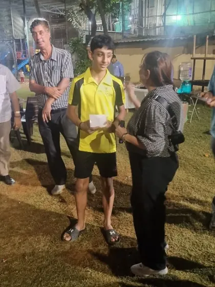 The award ceremony at the Parsi In-house tournament. Zehn's consistent performance earned him both the U18 and Men's Singles titles.