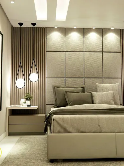 A full view of the bed and its feature wall, showcasing the interplay of light, texture, and form.