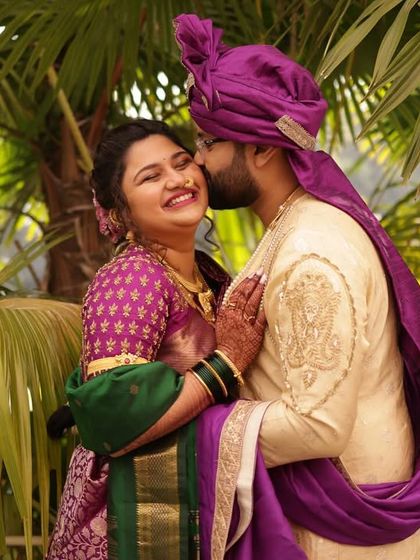 A sweet, affectionate moment between my best friend and her groom on their wedding day. I coordinated his regal purple pheta and stole with the rich purple in her traditional wedding saree.