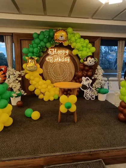This wide shot shows how the jungle theme transforms a stage area into a playful safari.