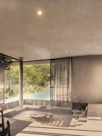 The House of Veils is a study in creating privacy and soft moods on a compact site. This view shows how we use floor-to-ceiling glazing, a sunken conversation pit, and filtered light from architectural screens to create living spaces that feel both expansive and intimately connected to the outdoors.
