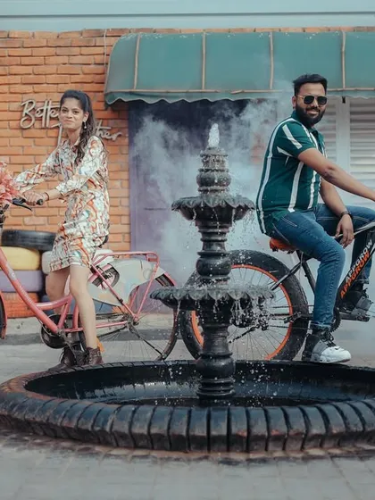 A fun shot with bicycles in front of a studio set designed to look like a European street cafe. Props like these add a playful element to the shoot.