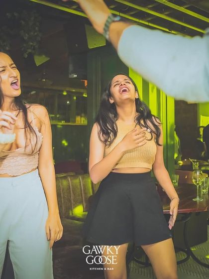 Candid shot of guests laughing and dancing. These are the moments I live for.