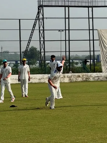 A dynamic fielding scene from a competitive match. Our training emphasizes all-round excellence, ensuring our players are sharp and agile in every department of the game.