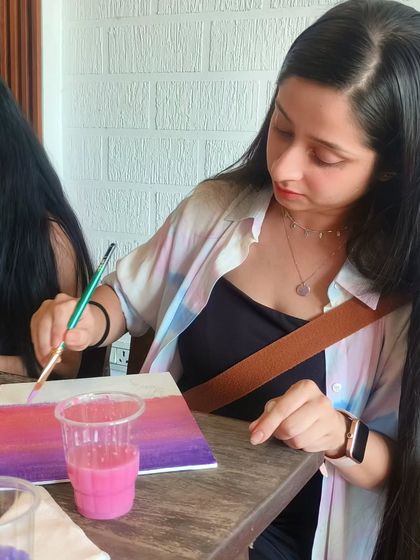 A moment of concentration while painting a beautiful sunset gradient. The blending on this was just perfect.