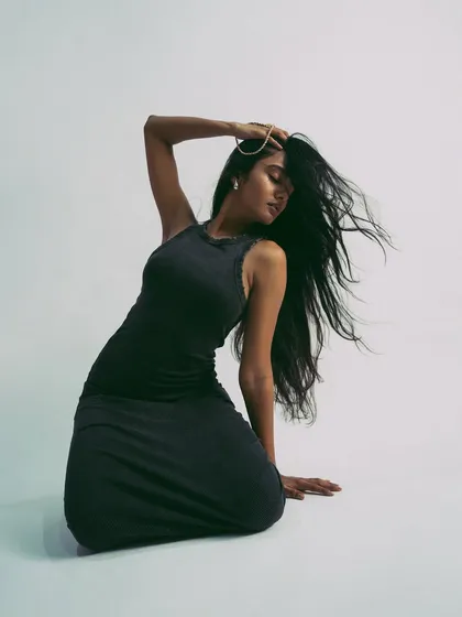 Capturing motion with a simple hair flip. This adds a dynamic element to an otherwise minimal studio shoot.