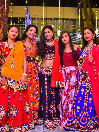 The crowd in full traditional attire at our Dandiya celebration. It's amazing to see everyone come together for nights like these.