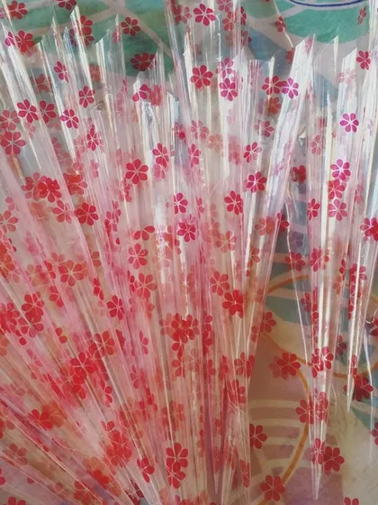 These are the empty cellophane sheets I use to roll my cones. The floral design adds a lovely touch to the final product.