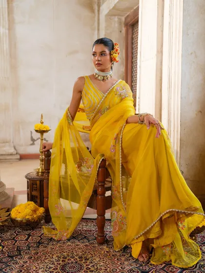 A stunning yellow saree from the Jashn-de-Fleurs collection by Anu Pellakuru, perfect for a haldi ceremony or summer wedding.