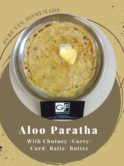 My homemade Aloo Paratha, stuffed with a spiced potato filling and cooked until golden. I serve it with your choice of chutney, curd, or butter for a filling meal.