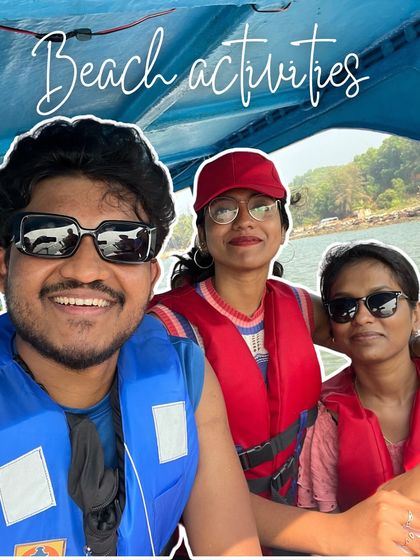 A selfie capturing the fun of beach activities in Gokarna. Life jackets on, smiles all around!